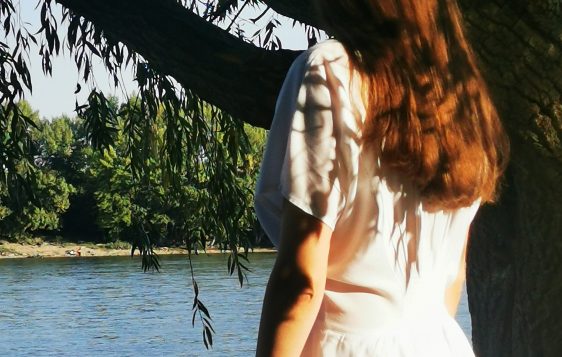 woman wearing a modest white dress